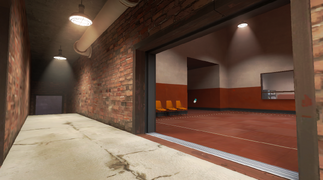 The second exit leading to both the walkway and the control room in the storage facility